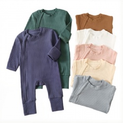 Long-sleeved jumpsuit with side flaps